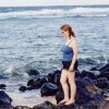 [Becky on a beach on Kauai]